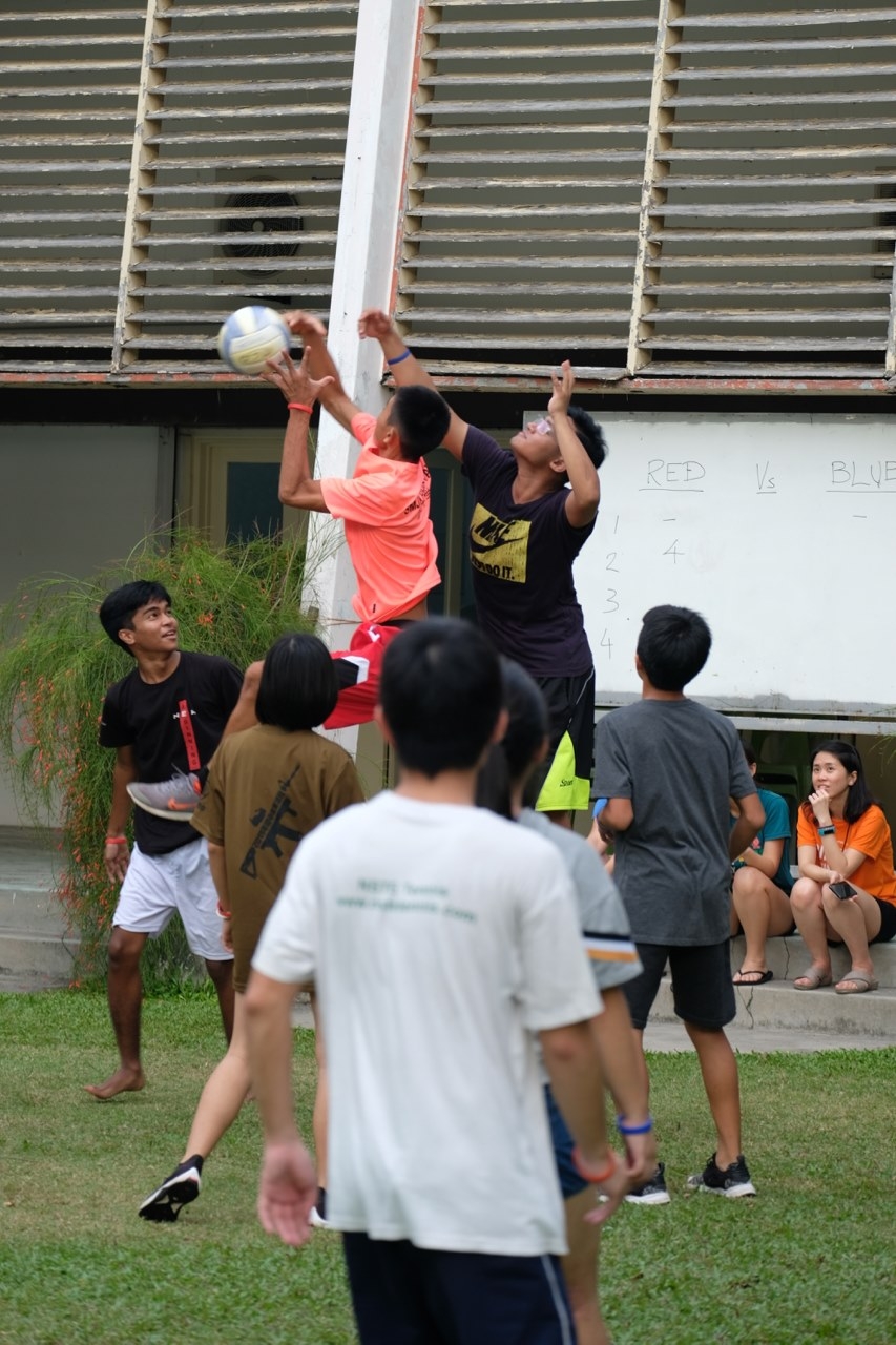 Young people playing captain ball
